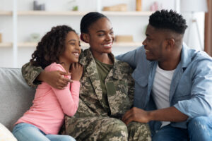 veteran with her family receiving TRICARE support