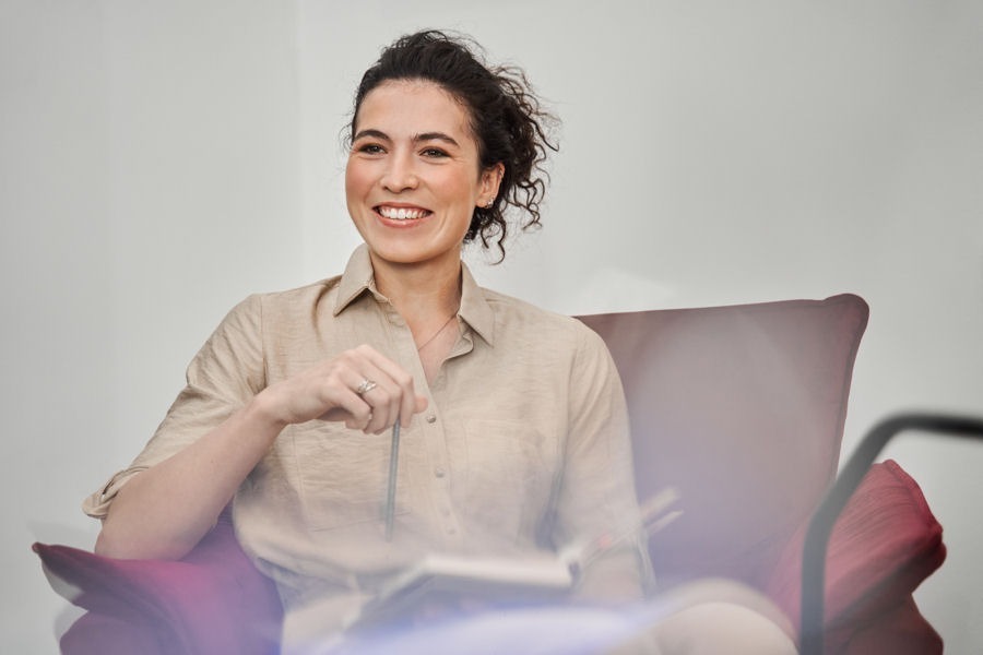 a woman smiling in addiction recovery