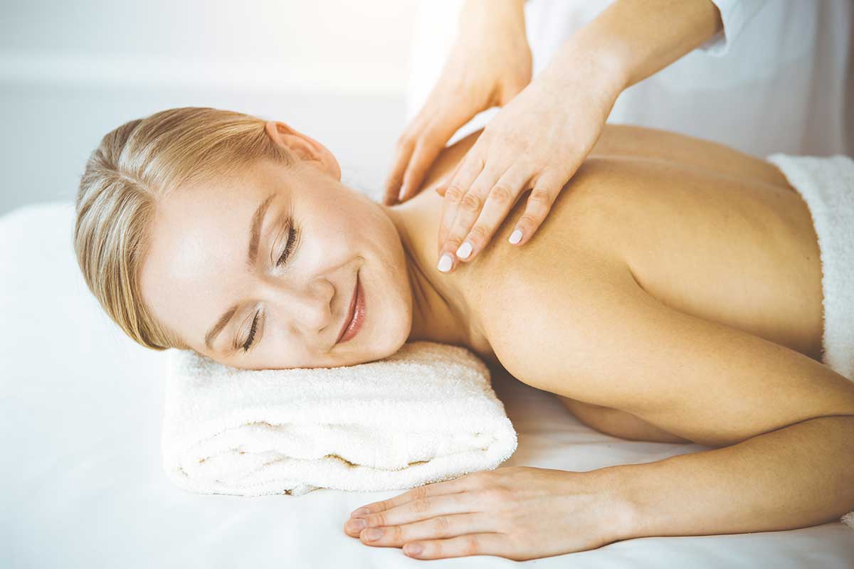 a woman benefits from a luxury rehab centers