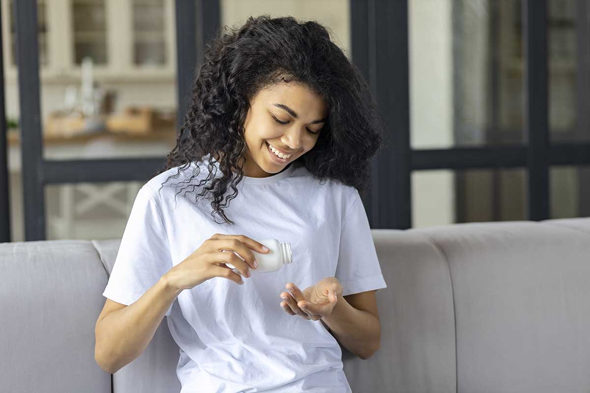 a woman benefits from medication assisted treatment