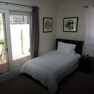single bed at houdini house sober living home