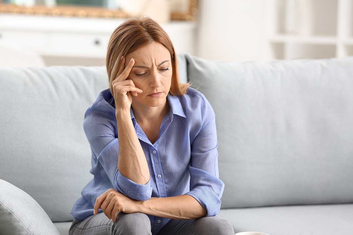 a woman experiences the long-term effects of painkillers on the body and considers the signs of painkiller abuse