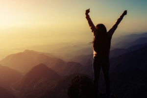 happy woman raising hands