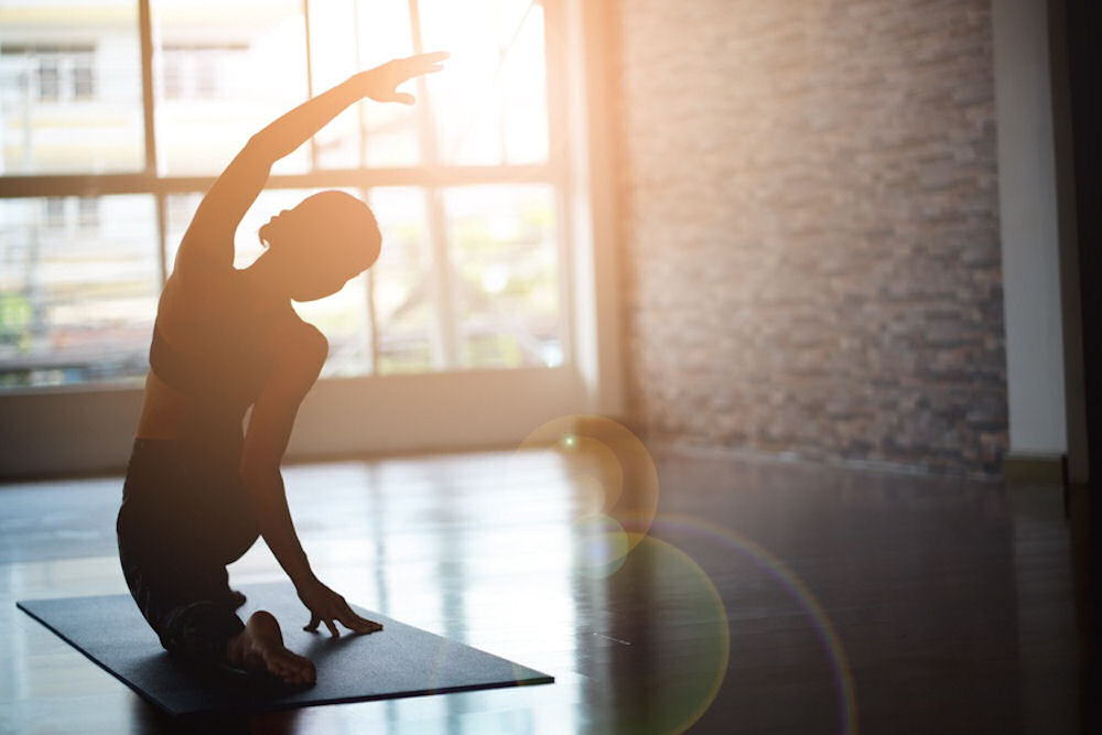 a-woman-working-out-doing-yoga