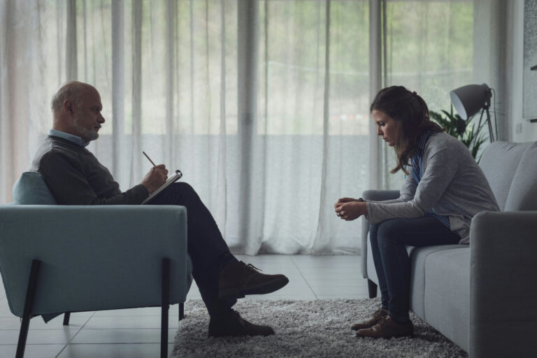 a-woman-sad-speaking-to-her-therapist