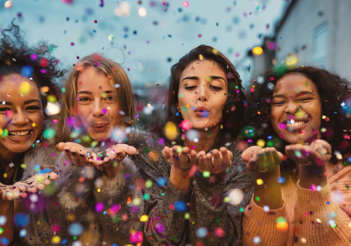 group of girls celebrating mental health as they set New Year’s resolutions